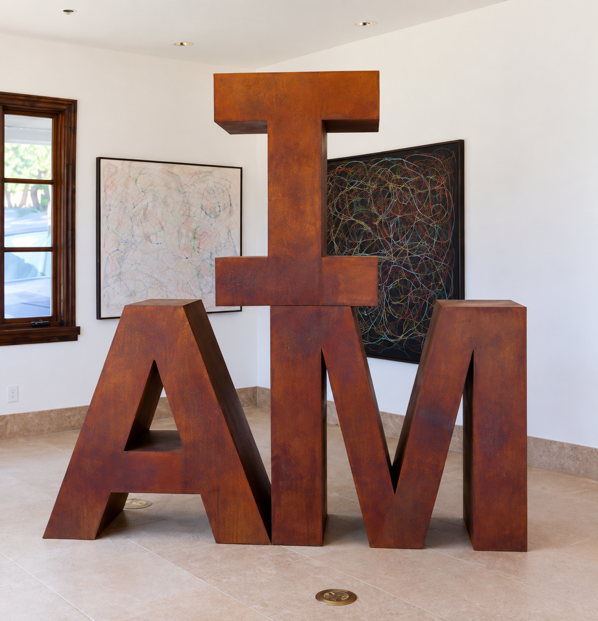 I AM steel sculpture by Greg Hinsdale, 7 ft high