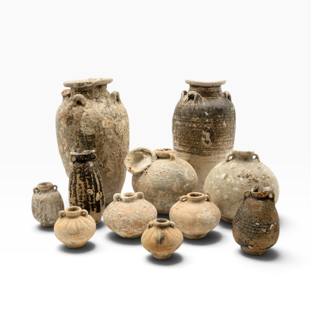 The Well by BDAntiques collection of antique shipwreck pottery vases with weathered textures and marine encrustations.