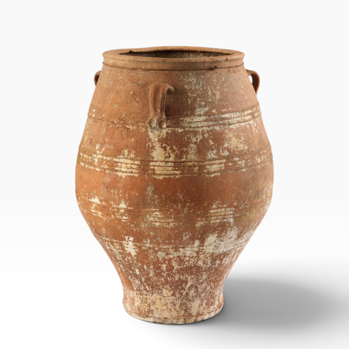 The Well by BDAntiques antique terracotta olive jar with three handles and a weathered, rustic finish.