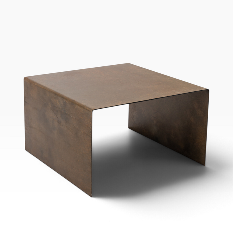 The Well by BDAntiques custom metal waterfall coffee table in a rustic brown finish with a sleek minimalist design.