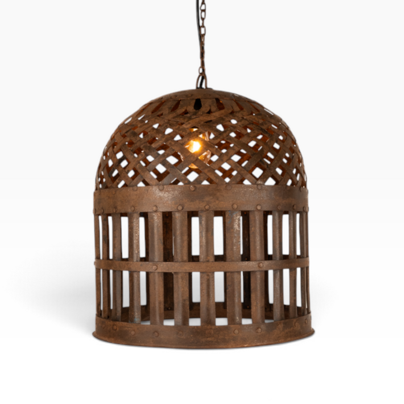 The Well by BDAntiques rustic metal cage pendant light with an intricate woven top and industrial farmhouse design.