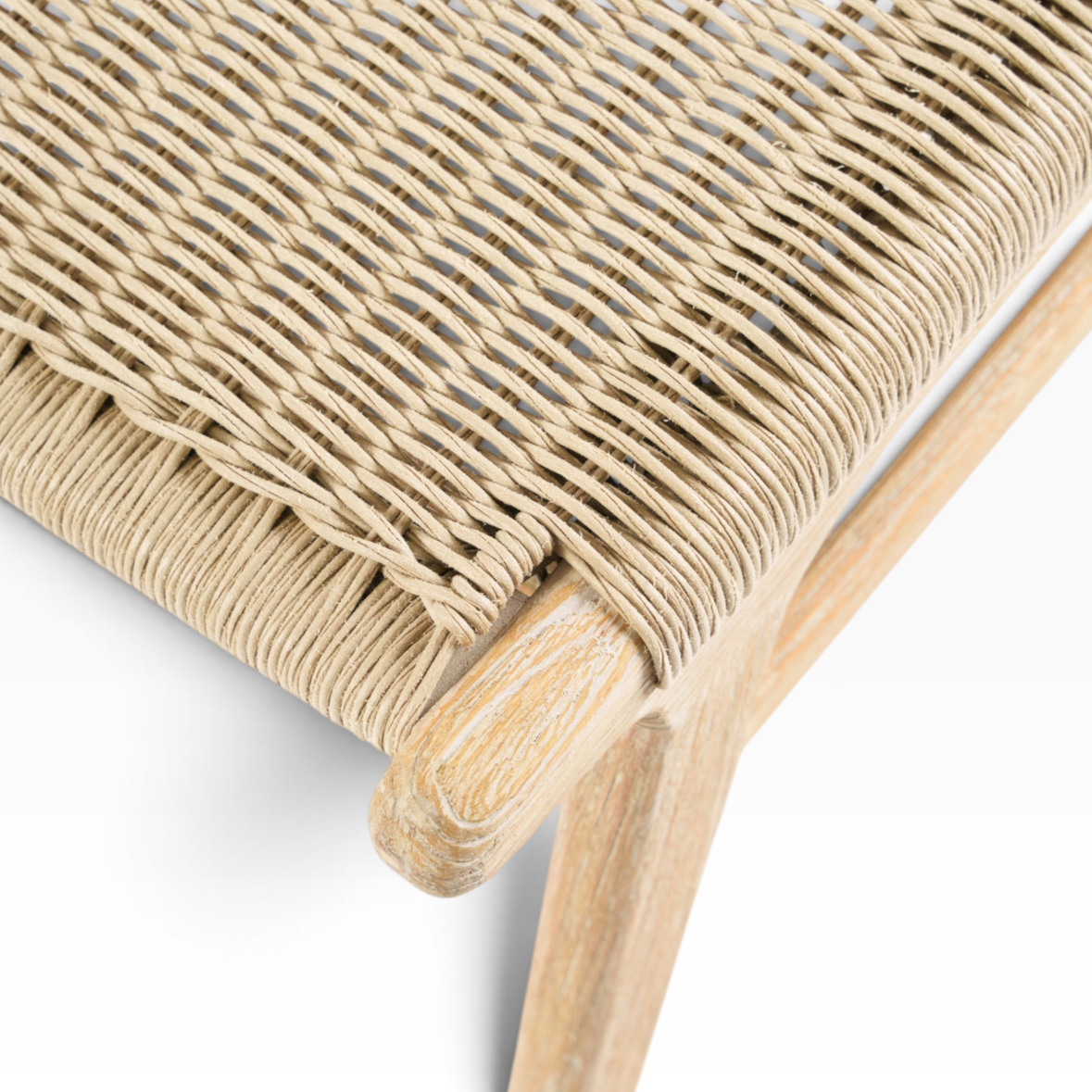 The Well by BDAntiques Sedona outdoor dining chair featuring a natural teak wood frame and woven resin wicker seat.
