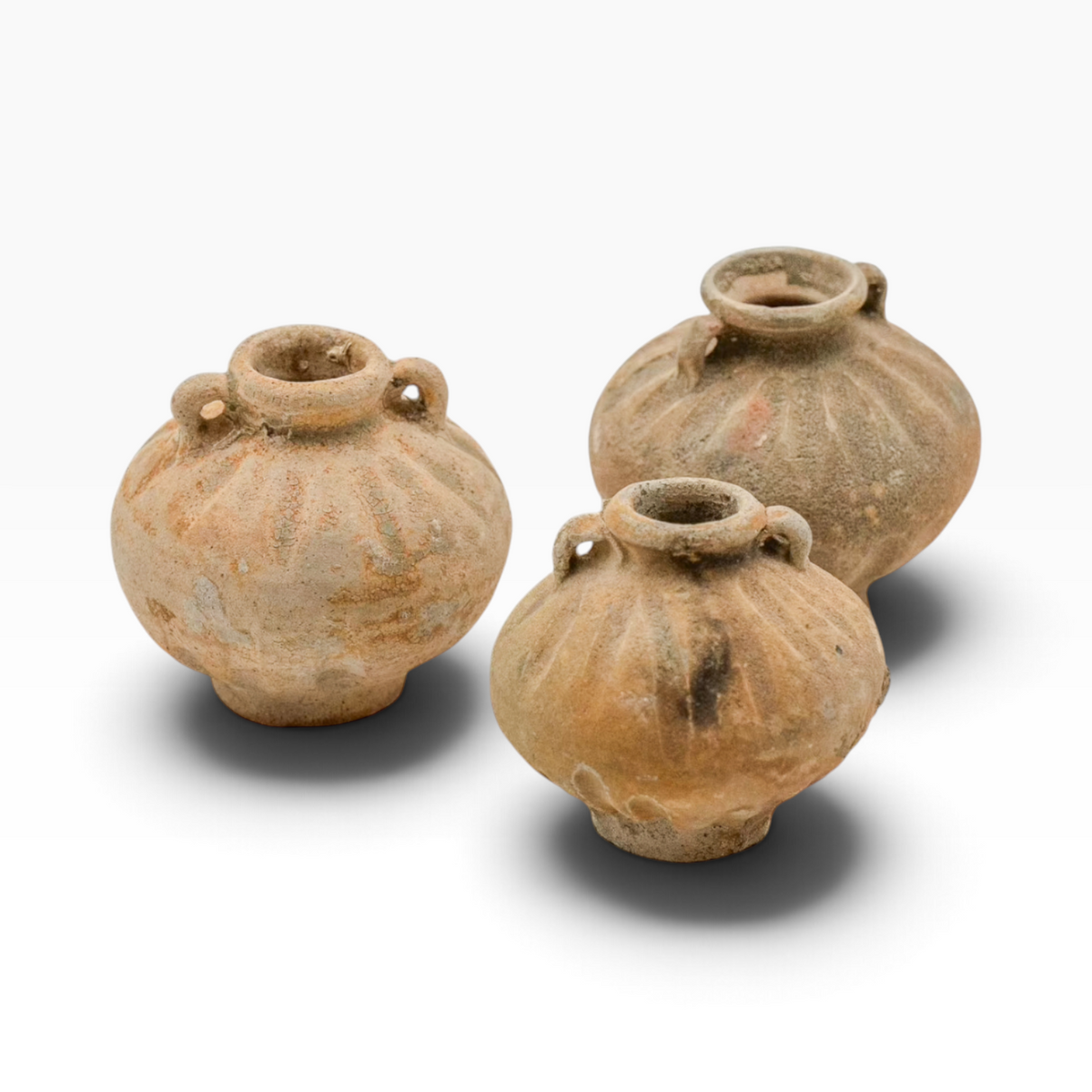 The Well by BDAntiques set of three small antique shipwreck pottery vases with weathered textures and encrustations.