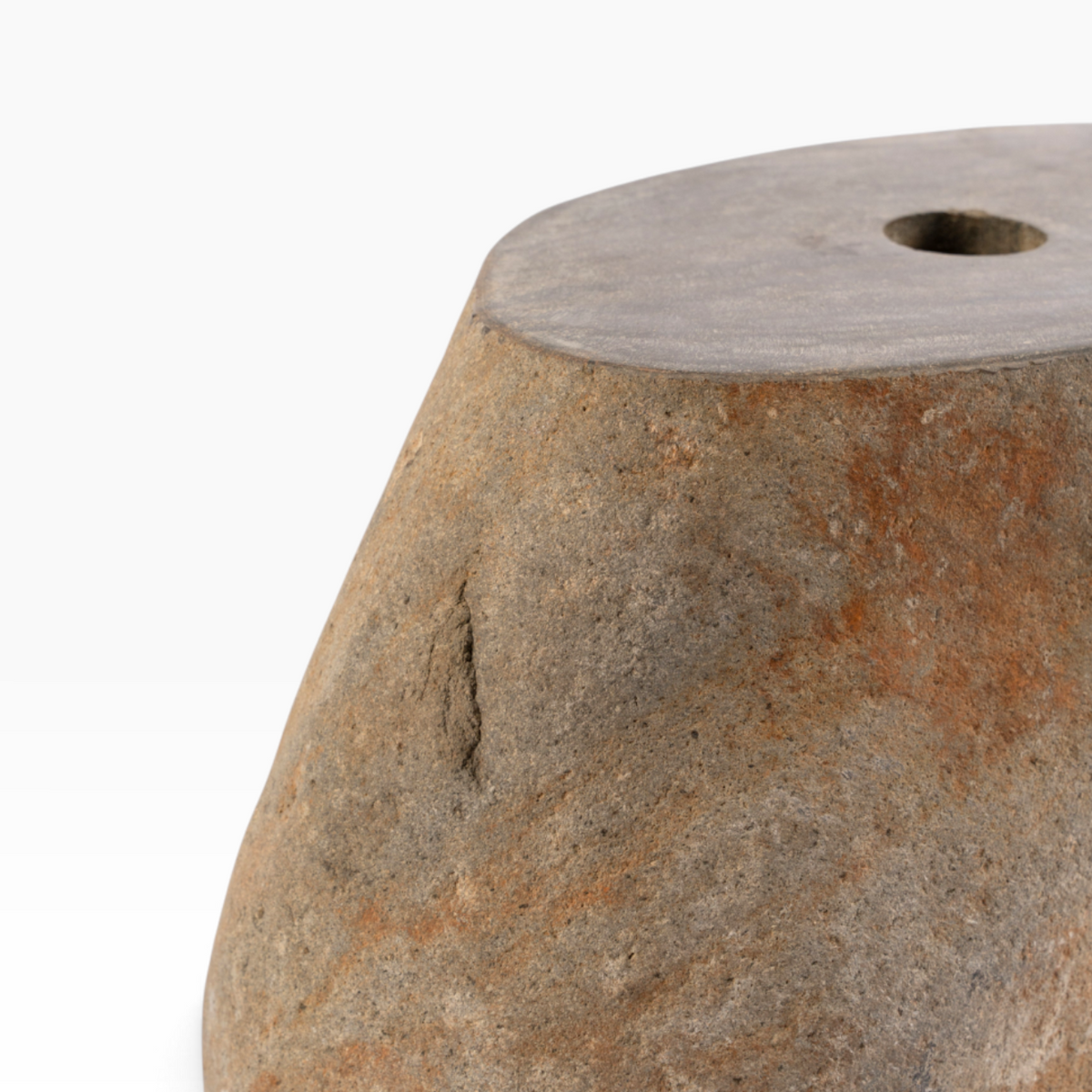 The Well by BDAntiques stone umbrella stand with a natural textured finish and a central hole for patio stability.