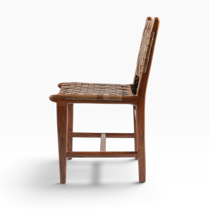 The Well by BDAntiques wooden dining chair with a handwoven tan leather seat and backrest, side profile view.